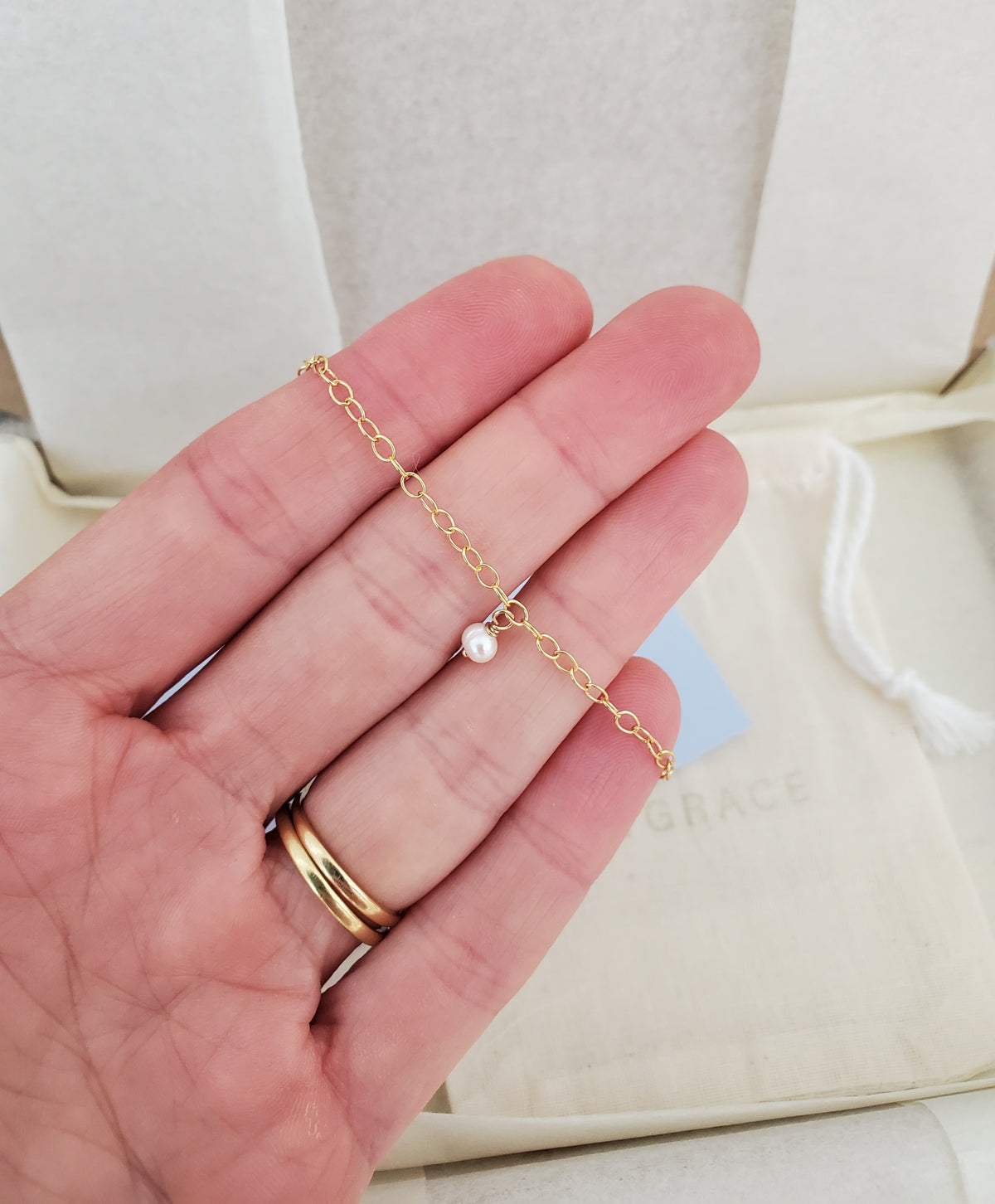 Dainty gold chain & freshwater pearl bracelet